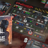 Dead by Daylight board game set with components and box on a dark surface