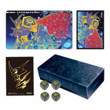 Collection of board game components including a box, dice, and artwork with a stylized dragon design.