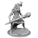Unpainted fantasy figurine with armor and weapon on a white background