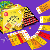 Board game 'Word Colony' with cards and box on a purple background