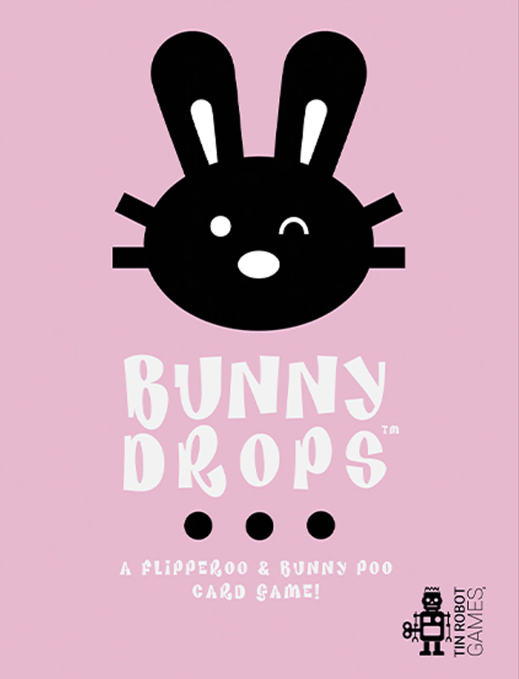 Bunny Drops card game packaging with black bunny face on pink background