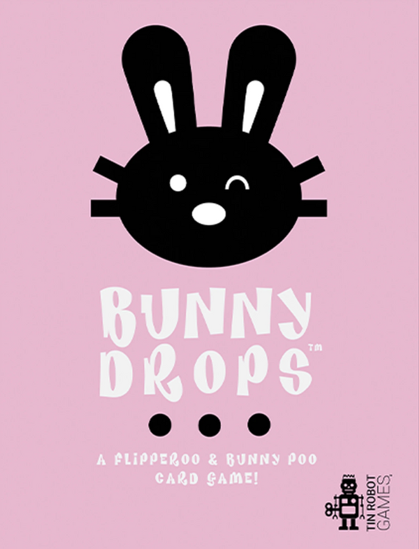 Bunny Drops card game packaging with black bunny face on pink background