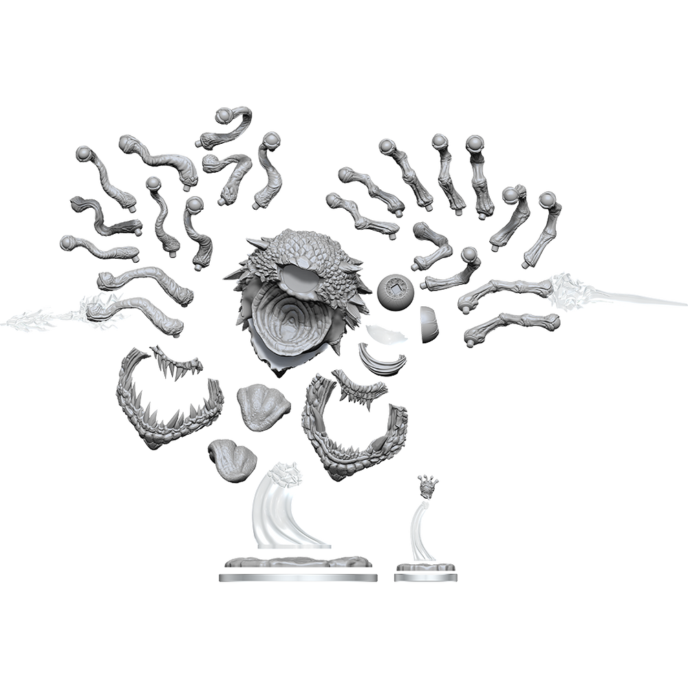 Gray plastic figurine parts on a white background