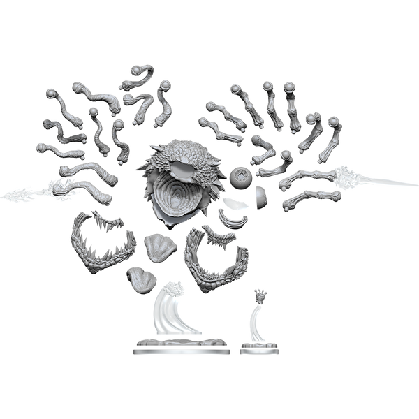 Gray plastic figurine parts on a white background