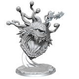 Unpainted fantasy dragon miniature on a white background