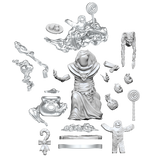 Unassembled model kit of a character with various parts on a white background