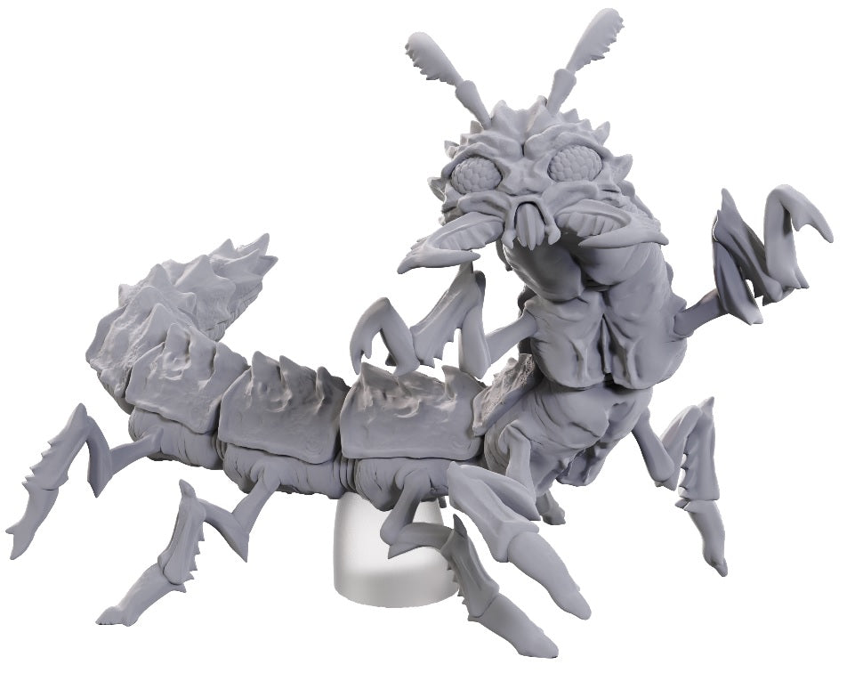 Gray fantasy creature figurine on a white background