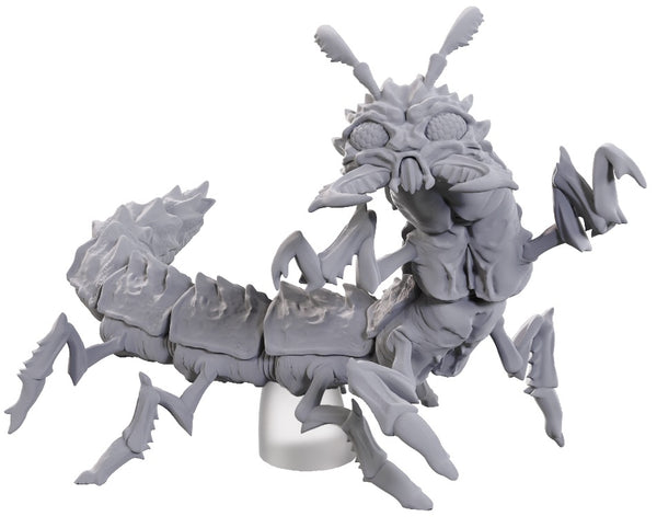 Gray fantasy creature figurine on a white background