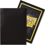 Black card sleeves with a yellow border featuring 'Dragon Shield' branding.
