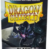 Box of Dragon Shield card sleeves with a dragon illustration on a black background