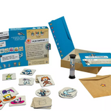 Board game components including cards, a box, and a mug on a white background
