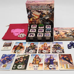 Robotech trading card game set with cards, dice, and box on a white background