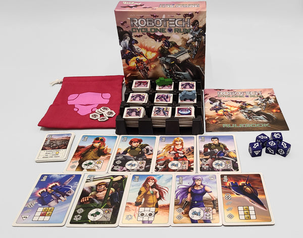 Robotech trading card game set with cards, dice, and box on a white background