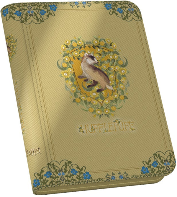 Decorative notebook with a cat illustration and 'Hufflepuff' text on a beige background