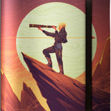 Notebook cover with a person on a mountain peak using a telescope, set against a large moon.